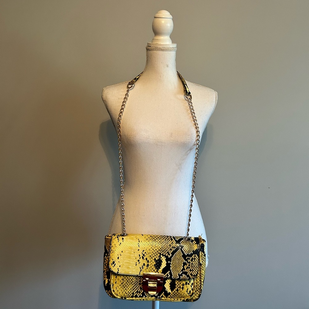 Charming Charlie snake print shoulder bag, black and yellow, gold hardware